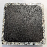 Close-up of the underside of a granite drink chiller base, showing textured grip for stability and durability