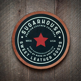 Round leather coaster with a black face and bold red star in the center. White text around the star reads: ‘Sugarhouse Premium Leather Coasters, Sweet Leather Goods, Made by Hand in America, MKE USA